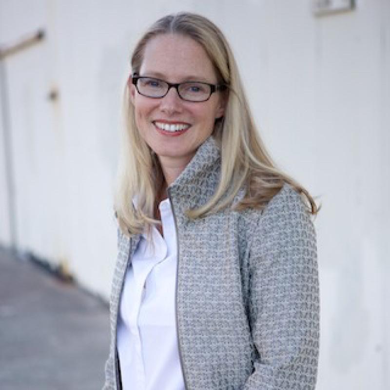 Wendy Ostroff in a gray coat 